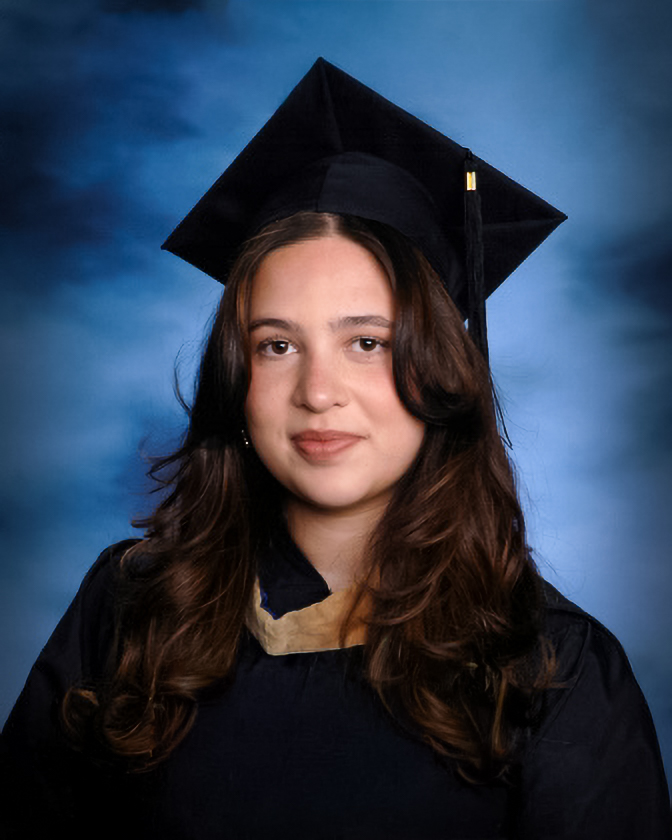 Sophia in graduation cap and gown portrait for the family Boston graduation guide website